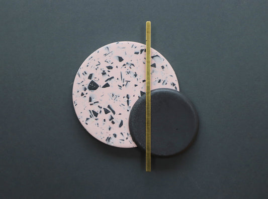 Black stoneware and terrazzo pink, black & brass wall hanging